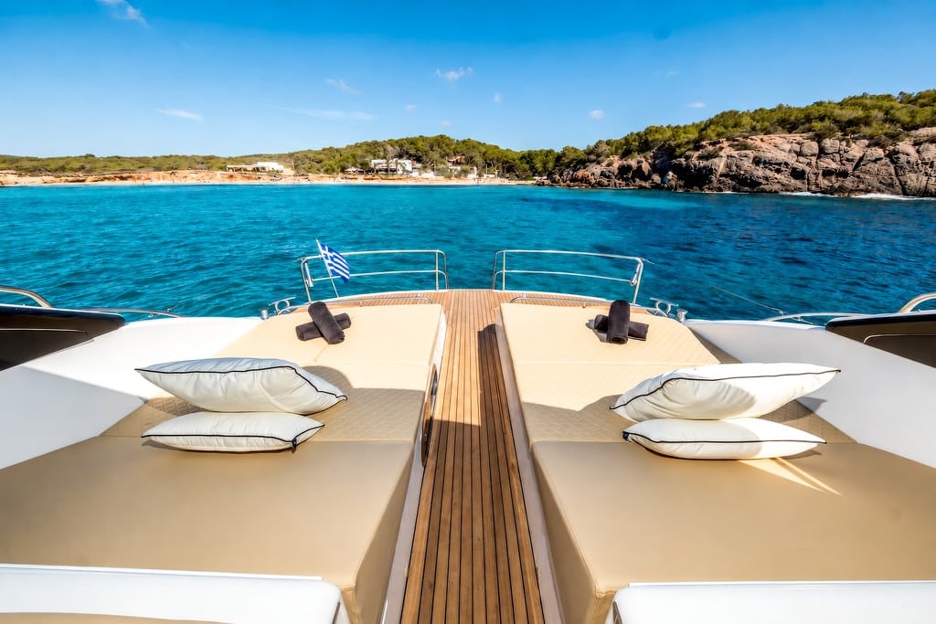 SeaDreamers yacht bow sunpads - SeaDreamers Bow sunpads of a luxury yacht over turquoise water
